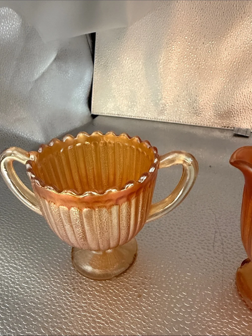 Vintage “Striped Rays” Carnival Glass sugar and creamer set.